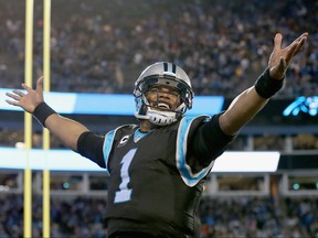 Cam Newton of the Carolina Panthers reacts after a touchdown against the Tampa Bay Buccaneers during their game at Bank of America Stadium on January 3, 2016 in Charlotte. (Streeter Lecka/Getty Images)