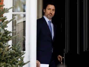 Prime Minister Justin Trudeau arrives at a news conference at Rideau Cottage in Ottawa, Wednesday, March 18, 2020.