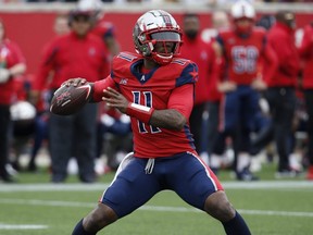 Quarterback P.J. Walker of the Houston Roughnecks throws a pass downfield against the Seattle Dragons during an XFL game at TDECU Stadium in Houston, Texas, on March 7, 2020.