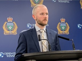 Det. Michael Streilein of the Winnipeg Police Service Financial Crimes Unit addresses the media at a press briefing at WPS headquarters on Monday. Winnipeg Police kicked off Fraud Prevention Month 2020 by warning on the 'Bank Investigator Scam' which cost Canadians $3.2 million in 2019 with Manitobans accounting for $1 million of those losses.