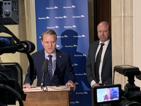 Manitoba Health Minister Cameron Friesen (left) and Dr. Brent Roussin, chief provincial public health officer, address the media at the Manitoba Legislative Building in Winnipeg on Tuesday, March 10, 2020. Glen Dawkins/Winnipeg Sun