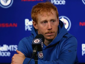Winnipeg Jets centre Cody Eakin meets with the media after scoring the winning goal against the Arizona Coyotes in Winnipeg on Monday. The Winnipeg Jets closed their dressing room to the media on Monday amid growing concern over the coronavirus.