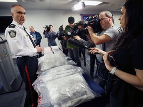 Insp. Max Waddell (left) of the Winnipeg Police Service's Guns and Gangs Unit discusses a large seizure of cocaine and cannabis at police headquarters in Winnipeg on Thurs., March 12, 2020.
Kevin King/Winnipeg Sun/Postmedia Network