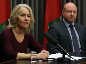 Lanette Siragusa (left), chief nursing officer for Manitoba Shared Heallth, speaks while Dr. Brent Roussin, the chief provincial public health officer, looks on during a COVID-19 briefing at the Manitoba Legislative Building on Sunday.