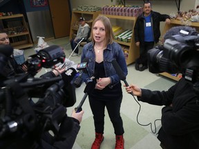 Tessa Blaikie Whitecloud, executive director at 1JustCity, speaks about remaining open during the COVID-19 pandemic during a media availability at St. Matthews-Maryland Community Ministry on McGee Avenue in Winnipeg on Monday.