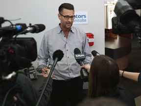 Dr. Fourie Smith, president of Doctors Manitoba, speaks to media about virtual care in light of the COVID-19 pandemic, from its office on Desjardins Drive in south Winnipeg on Monday.