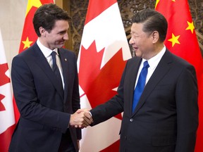 Prime Minister Justin Trudeau meets Chinese President Xi Jinping at the Diaoyutai State Guesthouse in Beijing, China on Tuesday, Dec. 5, 2017. (THE CANADIAN PRESS/Sean Kilpatrick)