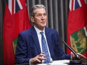 Premier Brian Pallister speaks to the media about COVID-19 at the Manitoba Legislative Building in Winnipeg on Monday.