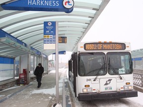 A Winnipeg Transit bus moves through the Harkness Station on the rapid transit line in Winnipeg, Man. Wednesday January 14, 2015. Brian Donogh/Winnipeg Sun/QMI Agency