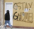 Masks, signs and boarded up stores continue during COVID-19 in Toronto on Wednesday, April 15, 2020.