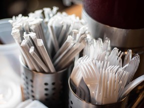 Plastic straws wrapped in paper and plastic forks are seen at a food hall in Washington, D.C. on June 20, 2019. (ERIC BARADAT/AFP/Getty Images)