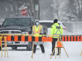 A steady line of vehicles brought people to the MPI location on Main Street for Covid-19 testing on Friday, April 3, 2020. Chris Procaylo/Winnipeg Sun