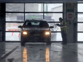 A steady line of vehicles brought people to the MPI location on Main Street for Covid-19 testing.  It is the second drive through testing location, in Winnipeg on Friday, April 3, 2020.