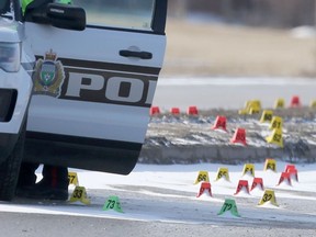 Police markers surround cruiser following an officer-involved shooting on April 9 on Lagimodiere Boulevard. On Thursday, the Independent Investigations Unit, the provincial watch dog for police agencies, sent out a call looking for witnesses to an officer-involved shooting on April 9 on Lagimodiere Boulevard that resulted in the death of 16-year-old Eishia Hudson.
