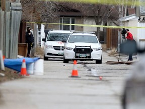 Police cruisers at the scene of an officer-involved shooting on Saturday morning, the third such incident in the last two weeks.