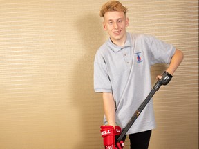 Amputee Madisson Howanyk, 20, of Winnipeg, shows off the special device he uses to hold onto a hockey stick. As April marks Limb Loss Awareness Month, amputees like Howanyk demonstrate that an amputation is not a barrier to living a full and active life.