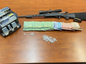 On Sunday evening, Manitoba West District CREST (Crime Reduction Enforcement Support Team) along with Dauphin RCMP, executed a search warrant at a residence in Dauphin. RCMP officers seized crack cocaine, a large sum of cash, a cash counting machine and a .30-06 calibre rifle.