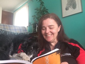 Claire Mackley reads to her 10-year-old border collie Tanner as part of the Therapy Animals Involved in Literacy Skills (T.A.I.L.S.) program being launched in Winnipeg by St. John Ambulance. Due to COVID-19, the launch will be virtual for the time being and will be presented initially to interested schools who have benefited from St. John Ambulance's Special Paws for Special Kids program in hopes that this can provide them with some extracurricular programming throughout the COVID -19 crisis.