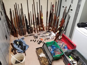 A cache of firearms seized during a search of a property located in the RM of Brenda-Waskada, just outside Melita on Saturday, April 18, following a joint investigation by RCMP officers including RCMP National Weapons Enforcement Support Team (NWEST), and Winnipeg Police Service into unlawful possession of firearms. With the assistance of the RCMP Emergency Response Team, officers searched the residence and seized over 30 prohibited, restricted and non-restricted firearms, ammunition and a small quantity of cocaine.