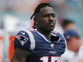 Antonio Brown of the New England Patriots looks on against the Miami Dolphins during the fourth quarter at Hard Rock Stadium on September 15, 2019 in Miami, Florida.