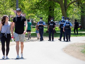 Toronto Police and special constables patrol Trinity Bellwoods Park in Toronto May 24, 2020.