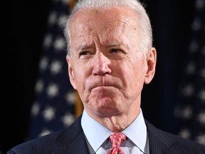 In this file photo taken on March 12, 2020, former U.S. Vice President and Democratic presidential hopeful Joe Biden speaks about COVID-19 during a press event in Wilmington, Delaware.