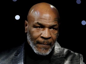 Former boxer Mike Tyson attends a fight between Deontay Wilder and Tyson Fury for the WBC Heavyweight Title at The Grand Garden Arena at MGM Grand, Las Vegas, on Feb. 22, 2020.