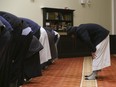 Members of the Salaheddin Islamic Centre mosque at midday prayer in Scarborough on Jan. 30, 2017.