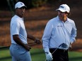 Tiger Woods (left) and Phil Mickelson.