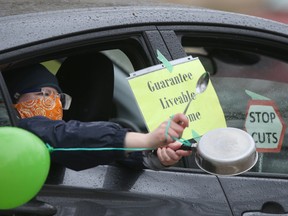 A noisy protest took place at the Manitoba Legislature today.  People demonstrated against austerity measures.   Wednesday, May 13/2020. Winnipeg Sun/Chris Procaylo/stf