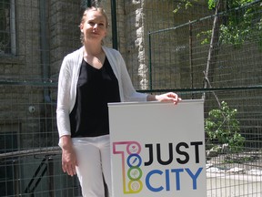 Tessa Blaikie Whitecloud, Executive Director of 1JustCity, stands beside Augustine United Church in Osborne Village in Winnipeg on Sunday, May 31, 2020. After keeping open for an additional two months due to COVID-19, 1JustCity closed its Just a Warm Sleep winter emergency overnight warming centre at Augustine United Church in Osborne Village on Sunday, May 31, 2020 allowing the charity to begin work on its long-awaited renovation.