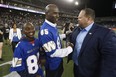 Former Winnipeg Blue Bomber Milt Stegall, along with his son Chase, is at his Ring of Fame ceremony in 2016.