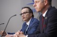 Chief Danny Smyth, Winnipeg Police Service along with Mayor Brian Bowman and Chief John Lane, Winnipeg Fire and Paramedic Service provide their reaction to the events in Minneapolis, across the US and in Canada during a media conference at City Hall on Tuesday.