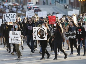 Thousands of people march in solidarity with the George Floyd protests across the United States in Winnipeg, Friday, June 5, 2020.