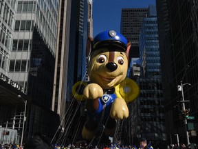 The Chase balloon from Paw Patrol floats on 6th Ave. during the annual Macy's Thanksgiving Day parade on November 23, 2017 in New York City. Chase is a fictional German Shepherd pup depicted as a young police officer who helps people. There have been calls from some for the character to be eliminated because they say it depicts police in too positive a light.