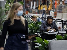 Councillors are working to have a $500 fee for temporary restaurant patios removed.