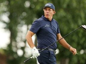 CROMWELL, CONNECTICUT - JUNE 26: Phil Mickelson of the United States reacts to his shot on the 18th tee during the second round of the Travelers Championship at TPC River Highlands on June 26, 2020 in Cromwell, Connecticut.