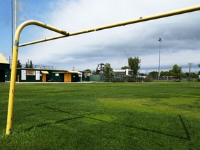 A goalpost throws a shadow onto the football field at the Old Exhibition Grounds on McPhillips Street in Winnipeg on Sun., June 7, 2020.