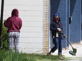 A woman wearing an N-95 mask, in Winnipeg Saturday.