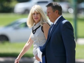 Sport, Culture, and Heritage Minister Cath Cox, Minister responsible for the status of women (left) with Justice Minister Cliff Cullen, in Winnipeg.  Wednesday, June 24/2020. Winnipeg Sun/Chris Procaylo/stf