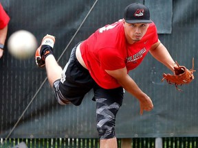 It’s been a wild 2020 ride for Goldeyes pitcher Dylan Rheault, shown here throwing for the Richmond Flying Squirrels in 2018.