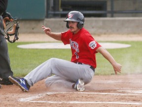 Winnipeg’s Kevin Lachance slides home on Saturday, July 4th, during the Fargo-Moorhead RedHawks baseball game against the Winnipeg Goldeyes at Newman Outdoor Field in Fargo, N.D.