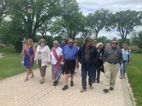 Metis elder John Morrisseau led a group of about 20 people on a protest at Louis Riel's gravesite in Winnipeg on Thursday. Nicole Wong/Winnipeg Sun