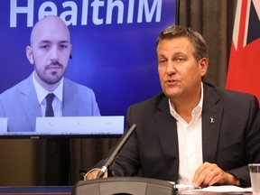 Justice Minister Cliff Cullen announced the province is expanding the use of the app HealthIM to all police forces in the province during a press conference at the Manitoba Legislature in in Winnipeg on Thursday, July 16, 2020. Josh Aldrich/Winnipeg Sun