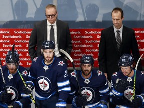 Head coach Paul Maurice of the Winnipeg Jets looks on during the first period against the Vancouver Canucks on Wednesday night.