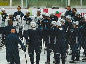 Jets coach Paul Maurice addresses his team during training camp on Friday.