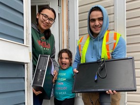 A Manitoba family receives a computer through the Tech Manitoba DigitALL Program. Tech Manitoba has distributed more than 100 desktop computers in July, 2020 to organizations, community centres as well as northern and First Nations communities across Manitoba through its DigitALL Program.