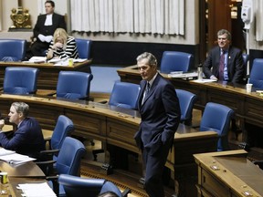 Manitoba Premier Brian Pallister makes his way to his seat during question period at the Manitoba Legislature in Winnipeg, Wednesday, May 6, 2020. A Manitoba Hutterite minister is telling the province to stop identifying colonies where members have tested positive for COVID-19 because it is leading to stigmatization.