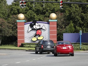LAKE BUENA VISTA, FL - JULY 11: A view of Mickey Mouse sign at the Walt Disney World theme park entrance on July 11, 2020 in Lake Buena Vista, Florida. The theme park reopened despite a surge in new COVID-19 infections throughout Florida, including the central part of the state where Orlando is located.