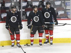 Flames Mark Giodano, TJ Brodie and Connor Mackey (L-R) during Calgary Flames training camp a the Saddledome in Calgary on Tuesday, July 14, 2020. Jim Wells/Postmedia